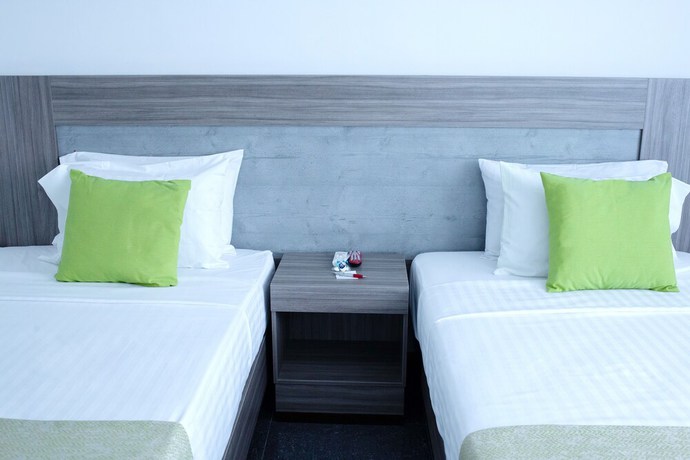 Imagen de la habitación del Hotel BE Suites Cali. Foto 10