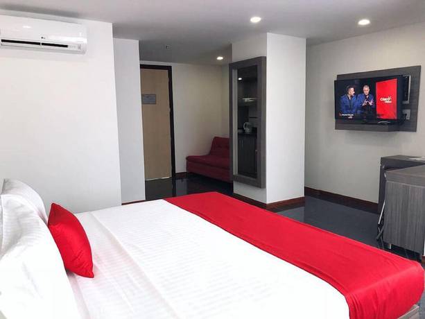 Imagen de la habitación del Hotel BE Suites Cali. Foto 11