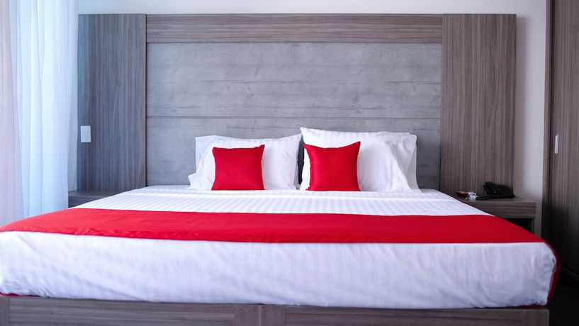 Imagen de la habitación del Hotel BE Suites Cali. Foto 13