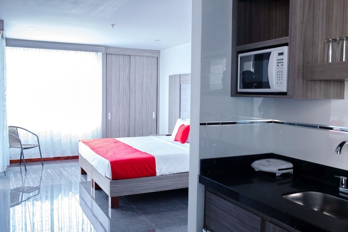 Imagen de la habitación del Hotel BE Suites Cali. Foto 14