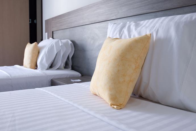 Imagen de la habitación del Hotel BE Suites Cali. Foto 15