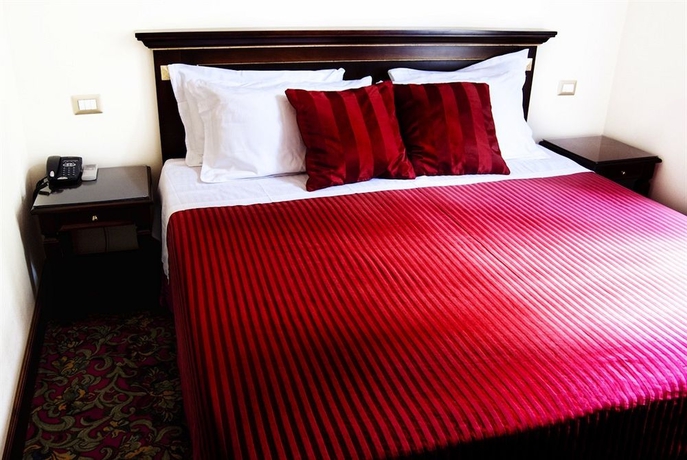 Imagen de la habitación del Hotel BEAU SITE, Via Veneto. Foto 2