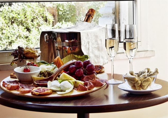 Imagen del bar/restaurante del Hotel BEAU SITE, Via Veneto. Foto 1