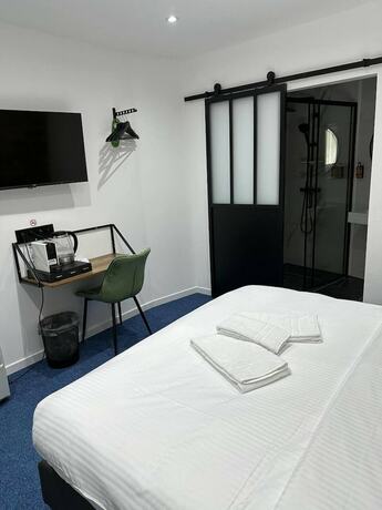 Imagen de la habitación del Hotel BED Cauchy. Foto 16