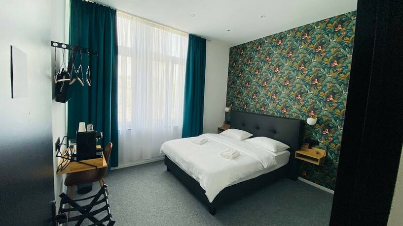 Imagen de la habitación del Hotel BED Cauchy. Foto 18