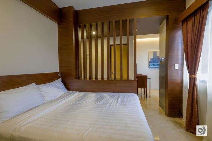 Imagen de la habitación del Hotel BED+BATH Serviced Suites. Foto 11