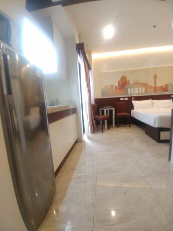 Imagen de la habitación del Hotel BED+BATH Serviced Suites. Foto 12