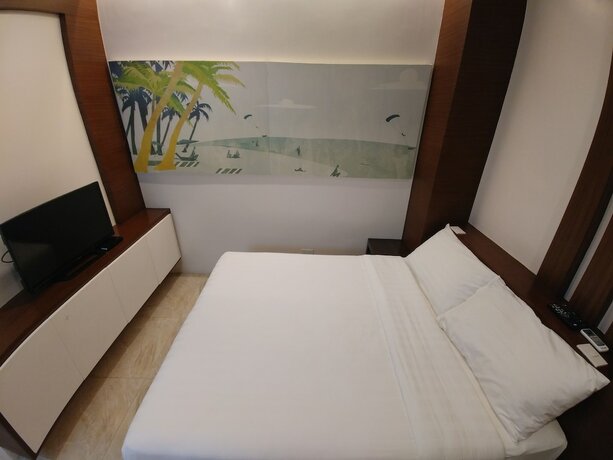 Imagen de la habitación del Hotel BED+BATH Serviced Suites. Foto 13