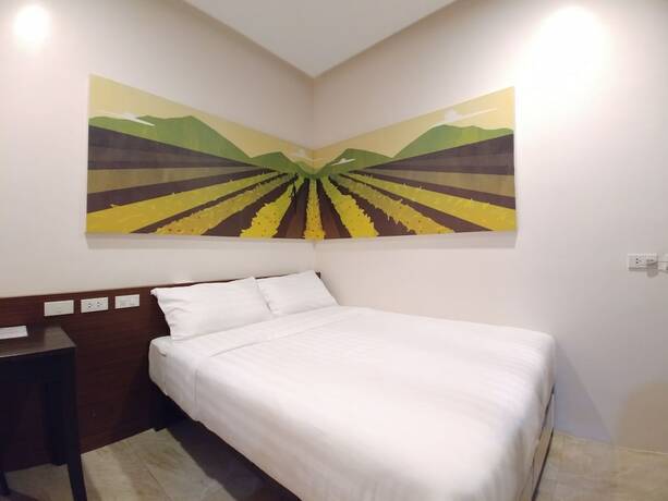 Imagen de la habitación del Hotel BED+BATH Serviced Suites. Foto 14