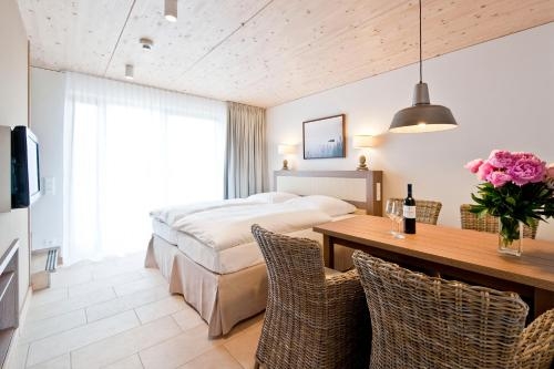 Imagen de la habitación del Hotel BEECH Resort Plauer See. Foto 9