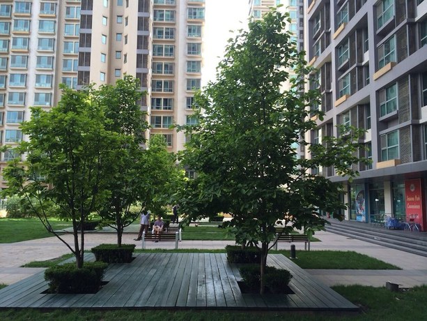 Imagen general del Hotel BEIJING SEASONS PARK APARTMENT. Foto 2