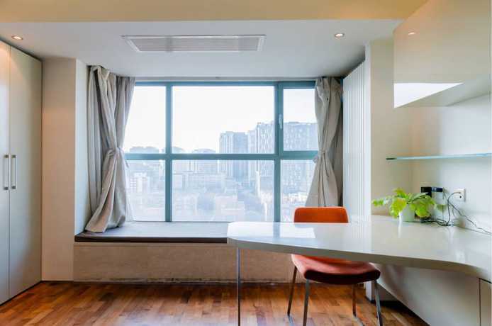 Imagen de la habitación del Hotel BEIJING SEASONS PARK APARTMENT. Foto 8