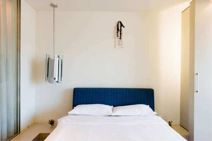 Imagen de la habitación del Hotel BEIJING SEASONS PARK APARTMENT. Foto 9