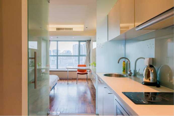 Imagen de la habitación del Hotel BEIJING SEASONS PARK APARTMENT. Foto 10