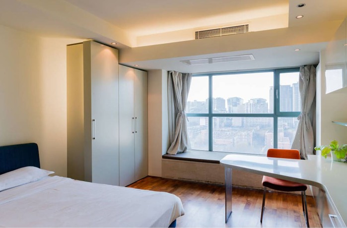 Imagen de la habitación del Hotel BEIJING SEASONS PARK APARTMENT. Foto 11