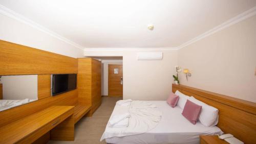 Imagen de la habitación del Hotel BESO BEACH HOTEL, &Ccedil;amyuva. Foto 17