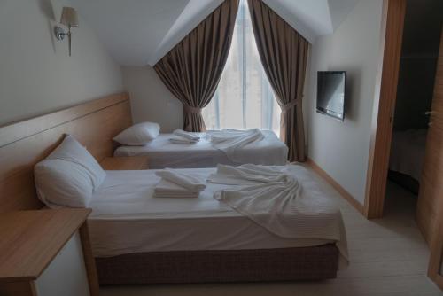 Imagen de la habitación del Hotel BESO BEACH HOTEL, &Ccedil;amyuva. Foto 19