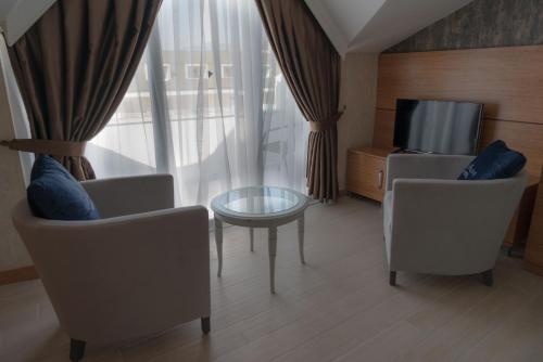 Imagen de la habitación del Hotel BESO BEACH HOTEL, &Ccedil;amyuva. Foto 20