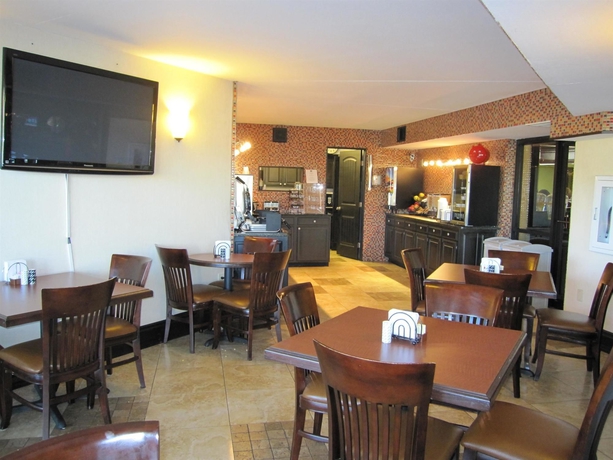 Imagen del bar/restaurante del Hotel BEST WESTERN WINDSOR SUITES. Foto 2