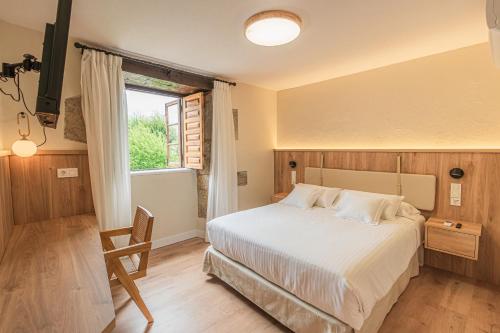 Imagen de la habitación del Hotel BESTPRICE Santillana. Foto 4