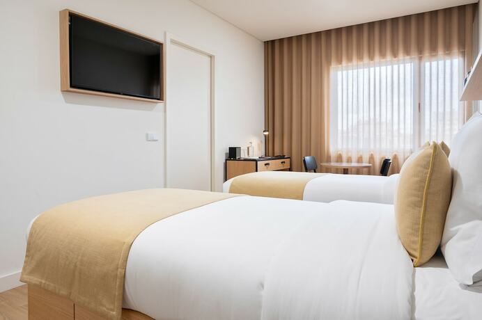 Imagen de la habitación del Hotel BFRESH - Pool - Fitness - Padel - By Oporto Collection - Private Parking. Foto 11