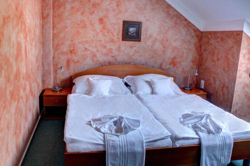 Imagen de la habitación del Hotel BIRDIE Pension & Wellness. Foto 6