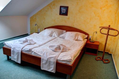 Imagen de la habitación del Hotel BIRDIE Pension & Wellness. Foto 7