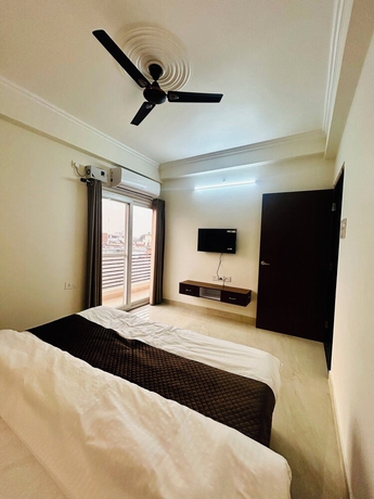 Imagen de la habitación del Hotel BK Homestay. Foto 11