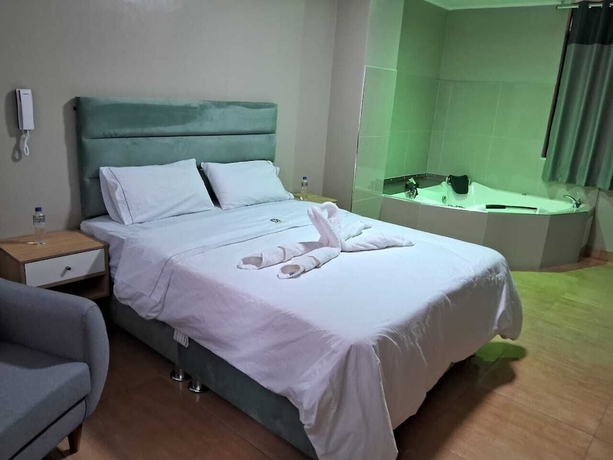 Imagen de la habitación del Hotel BLISS INN. Foto 12