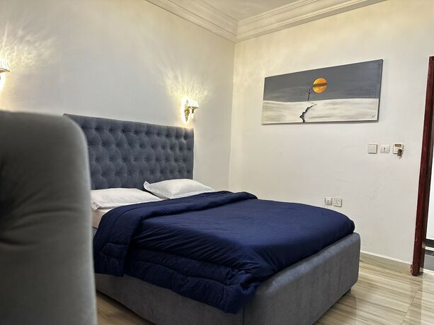 Imagen de la habitación del Hotel BLUE EMPIRE HOTEL. Foto 18