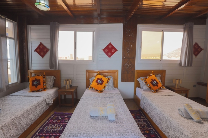 Imagen de la habitación del Hotel BLUERINA CAMP HOSTEL. Foto 3