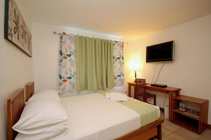 Imagen de la habitación del Hotel BLUEWAVES BEACH HOUSE. Foto 19