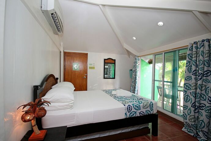 Imagen de la habitación del Hotel BLUEWAVES BEACH HOUSE. Foto 21