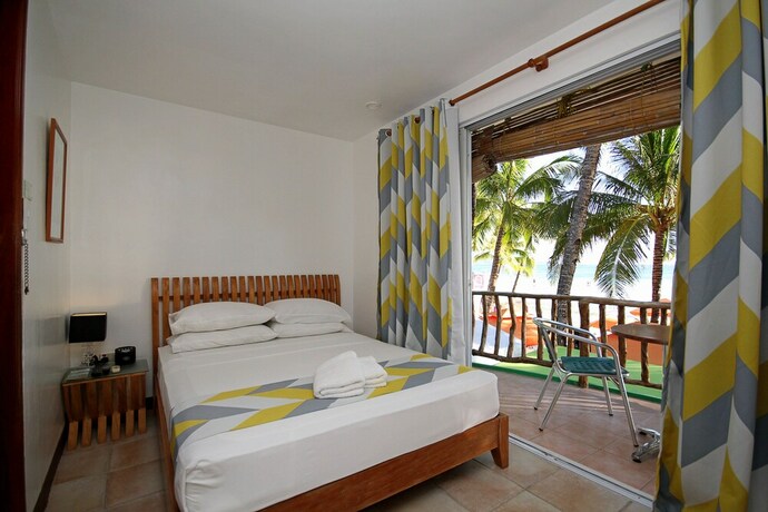 Imagen de la habitación del Hotel BLUEWAVES BEACH HOUSE. Foto 22