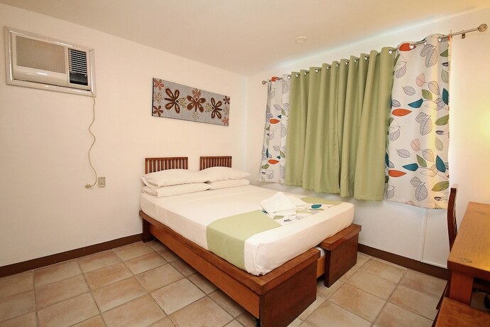 Imagen de la habitación del Hotel BLUEWAVES BEACH HOUSE. Foto 23