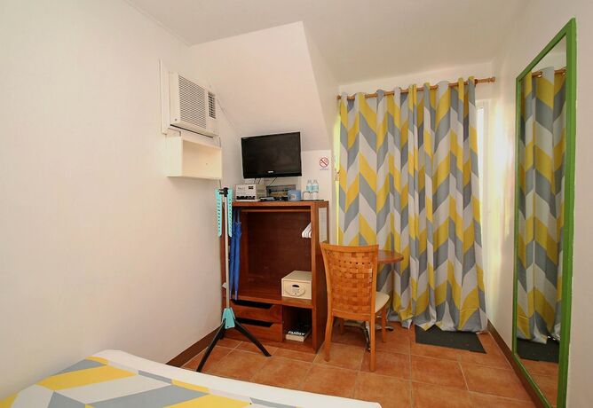 Imagen de la habitación del Hotel BLUEWAVES BEACH HOUSE. Foto 24