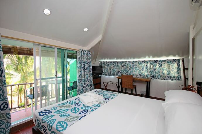 Imagen de la habitación del Hotel BLUEWAVES BEACH HOUSE. Foto 26
