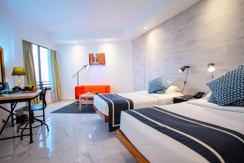 Imagen de la habitación del Hotel BM Beach. Foto 14