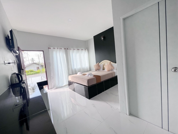 Imagen de la habitación del Hotel BM Beach Resort, Pak Bara. Foto 4