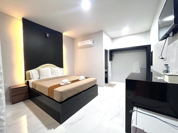 Imagen de la habitación del Hotel BM Beach Resort, Pak Bara. Foto 8