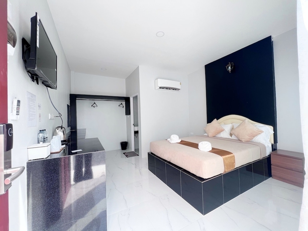 Imagen de la habitación del Hotel BM Beach Resort, Pak Bara. Foto 9