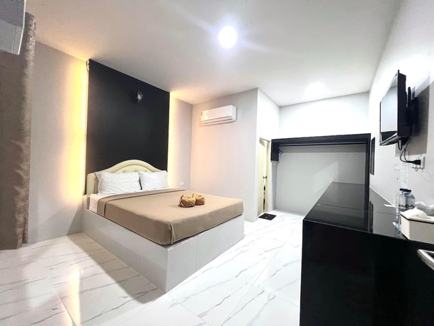 Imagen de la habitación del Hotel BM Beach Resort, Pak Bara. Foto 10