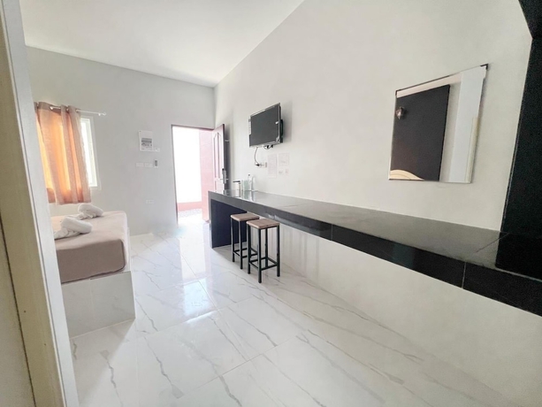 Imagen de la habitación del Hotel BM Beach Resort, Pak Bara. Foto 14