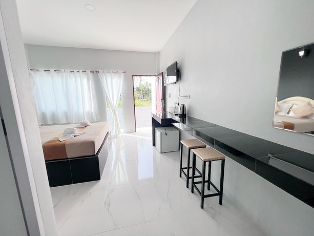 Imagen de la habitación del Hotel BM Beach Resort, Pak Bara. Foto 16