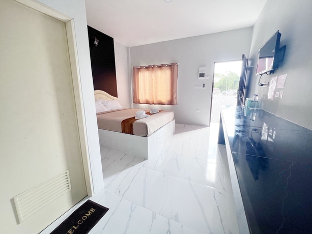 Imagen de la habitación del Hotel BM Beach Resort, Pak Bara. Foto 17