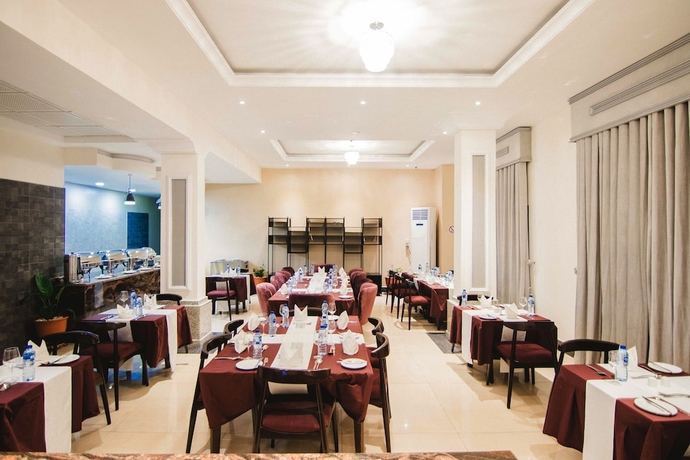 Imagen del bar/restaurante del Hotel BON Garden City Port Harcourt. Foto 3