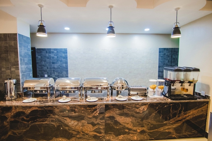 Imagen del bar/restaurante del Hotel BON Garden City Port Harcourt. Foto 6