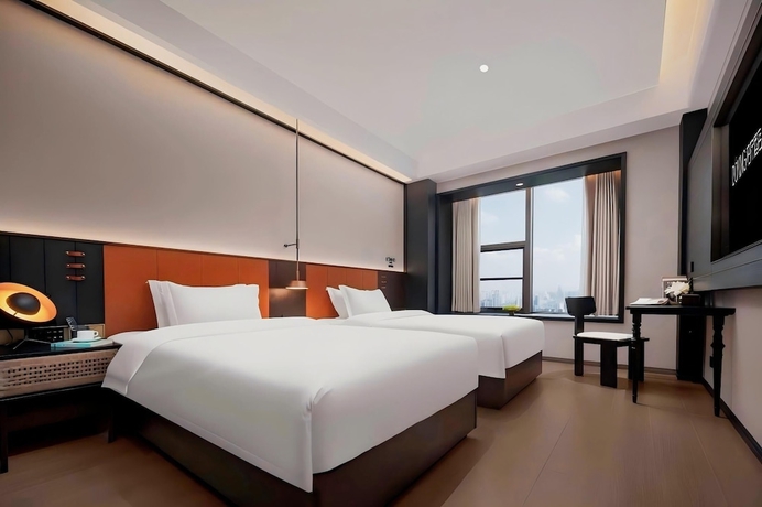 Imagen de la habitación del Hotel BONINGHOTEL. Foto 16
