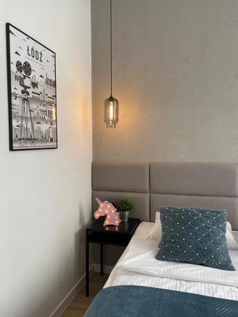 Imagen de la habitación del Hotel BOOGIE Home Kamienica Ł&oacute;dzka. Foto 13