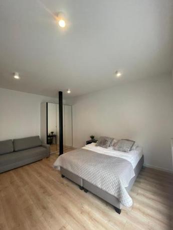 Imagen de la habitación del Hotel BOOGIE Home Kamienica Ł&oacute;dzka. Foto 16